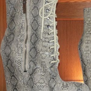 "Matiko" Snake embossed Leather boots.